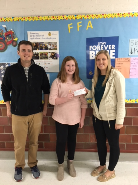 Mr. Hauge with Ashley Braun and FFA President Maggie Vyhnalek